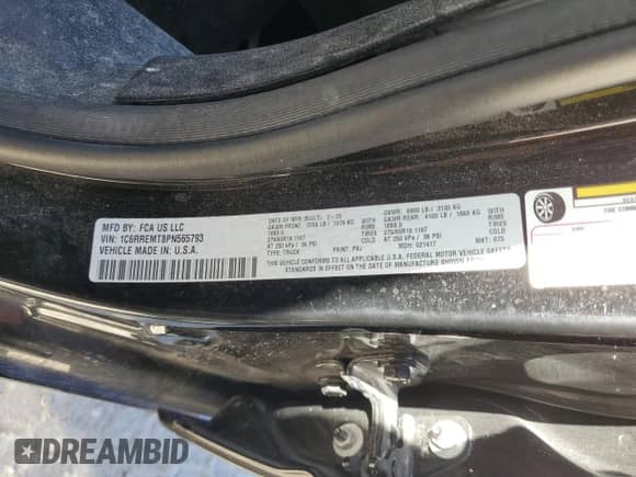 2023 Ram 1500 Lone Star with VIN 1C6RREMT8PN565793, listed as a Copart auction lot 77084184 with 18,825 mi miles and Salvage title. Bid and sale history available at DreamBid. Image 13.