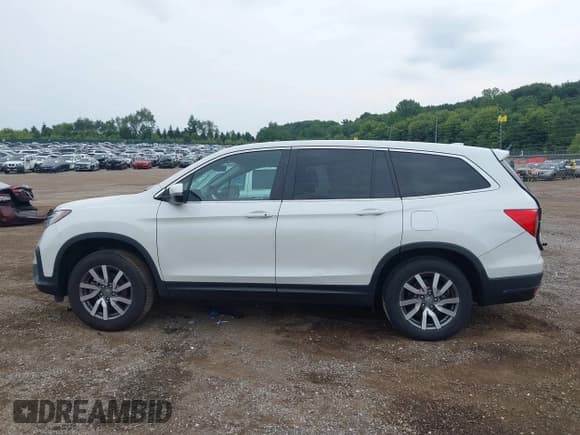 ✅ 2021 Honda Pilot EX-L • VIN: 5FNYF6H56MB064149 • Лот: 42872341. Опубликован ранее на IAAI с пробегом 75 886 миль. Бесплатный доступ к архиву аукционных продаж из США и подробный отчёт об истории автомобиля на DreamBid. Изображение 14.
