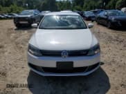 ✅ 2014 Volkswagen Jetta Hybrid • VIN: 3VW637AJ4EM332042 • Lot: 60296384. Wystawiony na Copart z przebiegiem 125 333 mil. Bezpłatny archiwum sprzedaży aukcyjnych z USA i szczegółowy raport historii pojazdu na DreamBid. Zdjęcie 5.