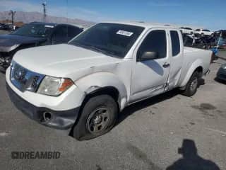 2012 Nissan Frontier S with VIN 1N6BD0CTXCC419881, listed as a Copart auction lot 86901364 with 154,243 mi miles and Salvage title. Bid and sale history available at DreamBid. Image 1.