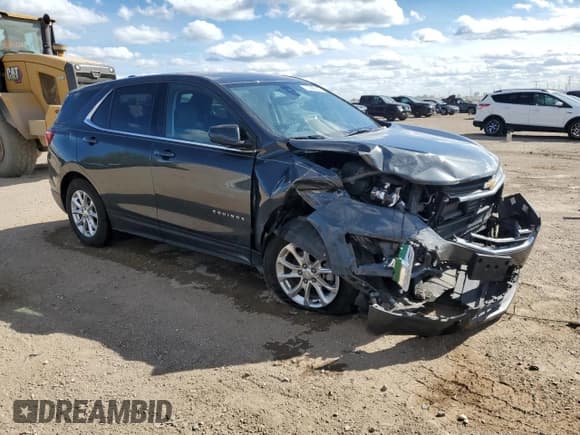 ✅ 2020 Chevrolet Equinox LT • VIN: 2GNAXTEV9L6264813 • Lot: 71268325. Listed on Copart with 66,238 mi. Free auction sales archive from the USA and detailed vehicle history report at DreamBid. Image 4.