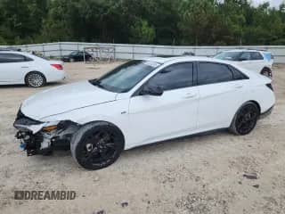 2024 Hyundai Elantra N Line with VIN KMHLR4DF0RU735183, listed as a Copart auction lot 84828245 with 20,883 mi miles and Salvage title. Bid and sale history available at DreamBid. Image 1.