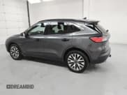 ✅ 2020 Ford Escape Titanium • VIN: 1FMCU9J90LUB20103 • Лот: 53809235. Опубликован ранее на Copart с пробегом 64 894 миль. Бесплатный доступ к архиву аукционных продаж из США и подробный отчёт об истории автомобиля на DreamBid. Изображение 2.