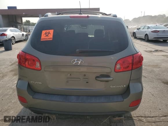 ✅ 2007 Hyundai Santa Fe SE • VIN: 5NMSH13E67H077335 • Lot: 70749084. Listed on Copart with 180,063 mi. Free auction sales archive from the USA and detailed vehicle history report at DreamBid. Image 6.