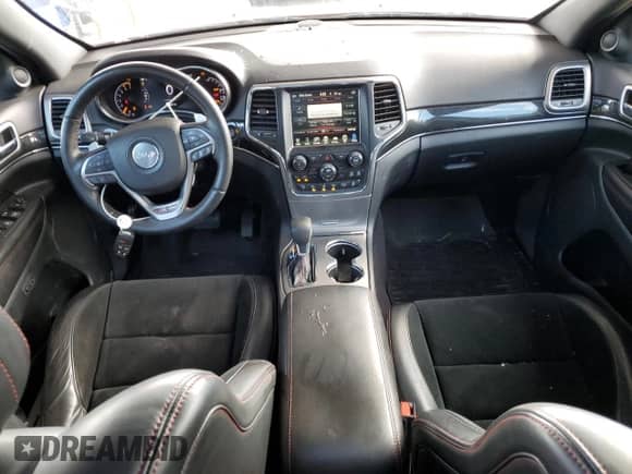 2017 Jeep Grand Cherokee Trailhawk with VIN 1C4RJFLT7HC742564, listed as a Copart auction lot 85261885 with 114,907 mi miles and Salvage title. Bid and sale history available at DreamBid. Image 8.