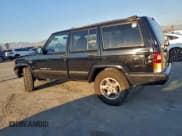 ✅ 2001 Jeep Cherokee Sport • VIN: 1J4FF48S51L596481 • Lot: 94193505. Listed on Copart with 127,415 mi. Free auction sales archive from the USA and detailed vehicle history report at DreamBid. Image 2.