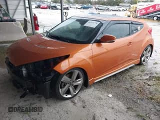 ✅ 2014 Hyundai Veloster Turbo • VIN: KMHTC6AE9EU185825 • Lot: 41371770. Wystawiony na IAAI z przebiegiem 113 325 mil. Bezpłatny archiwum sprzedaży aukcyjnych z USA i szczegółowy raport historii pojazdu na DreamBid. Zdjęcie 2.