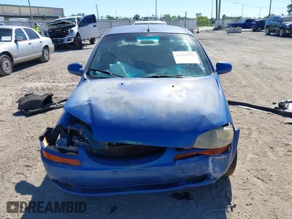 ✅ 2005 Chevrolet Aveo LS • VIN: KL1TD526X5B399695 • Lot: 42048951. Listed on IAAI with 128,466 mi. Free auction sales archive from the USA and detailed vehicle history report at DreamBid. Image 12.