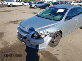 2012 Chevrolet Malibu 1LS with VIN 1G1ZB5E05CF240002, listed as a IAAI auction lot 43385460 with 151,059 mi miles and . Bid and sale history available at DreamBid. Image 6.