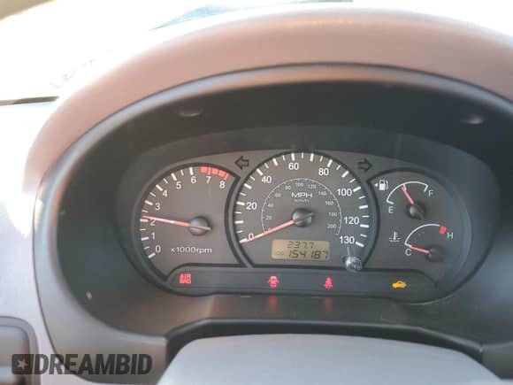 2005 Hyundai Accent GLS with VIN KMHCG45C95U665574, listed as a Copart auction lot 82603804 with 154,187 mi miles and Salvage title. Bid and sale history available at DreamBid. Image 9.