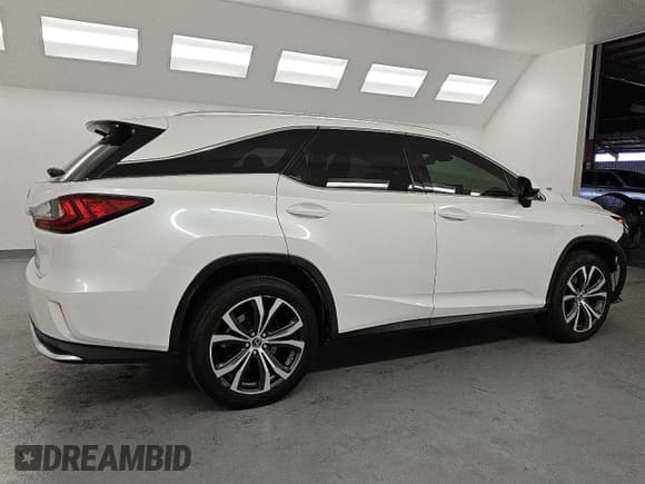 ✅ 2022 Lexus RX 350L • VIN: JTJHZKFA7N2038984 • Lot: 91164395. Wystawiony na Copart z przebiegiem 67 180 mil. Bezpłatny archiwum sprzedaży aukcyjnych z USA i szczegółowy raport historii pojazdu na DreamBid. Zdjęcie 3.