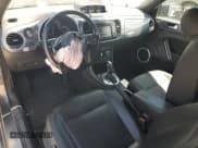 ✅ 2014 Volkswagen Beetle 2.0L TDI • VIN: 3VW5L7AT5EM819800 • Lot: 63522625. Listed on Copart with 81,641 mi. Free auction sales archive from the USA and detailed vehicle history report at DreamBid. Image 8.