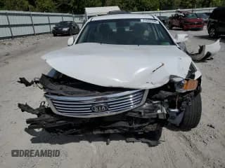 ✅ 2009 Kia Optima LX • VIN: KNAGE228695309998 • Лот: 71542794. Опубликован ранее на Copart с пробегом 92 744 миль. Бесплатный доступ к архиву аукционных продаж из США и подробный отчёт об истории автомобиля на DreamBid. Изображение 5.