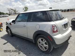 2012 MINI Hardtop with VIN WMWSU3C54CT186406, listed as a Copart auction lot 60940305 with 106,819 mi miles and Salvage title. Bid and sale history available at DreamBid. Image 2.