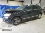 ✅ 2014 Volkswagen Touareg Sport • VIN: WVGEF9BP0ED008887 • Lot: 71643635. Listed on Copart with 233,433 mi. Free auction sales archive from the USA and detailed vehicle history report at DreamBid. Image 1.