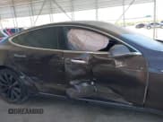 ✅ 2014 Tesla Model S P85D • VIN: 5YJSA1H28EFP65161 • Лот: 41846154. Опубликован ранее на IAAI с пробегом 112 263 миль. Бесплатный доступ к архиву аукционных продаж из США и подробный отчёт об истории автомобиля на DreamBid. Изображение 13.