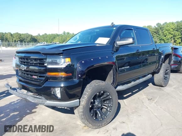 ✅ 2017 Chevrolet Silverado 1500 LT • VIN: 3GCUKREC6HG383016 • Lot: 43180014. Listed on IAAI with 121,340 mi. Free auction sales archive from the USA and detailed vehicle history report at DreamBid. Image 18.
