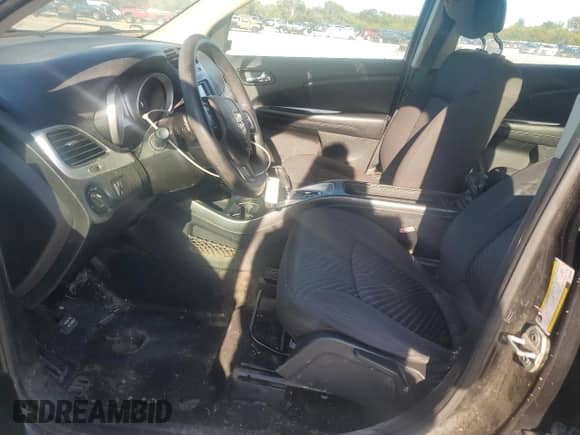 2013 Dodge Journey American Value with VIN 3C4PDCAB5DT597224, listed as a Copart auction lot 82536665 with 104,666 mi miles and Clean title. Bid and sale history available at DreamBid. Image 7.