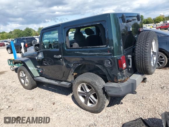 ✅ 2011 Jeep Wrangler Sahara • VIN: 1J4AA5D11BL638030 • Lot: 71621375. Listed on Copart with 91,831 mi. Free auction sales archive from the USA and detailed vehicle history report at DreamBid. Image 2.