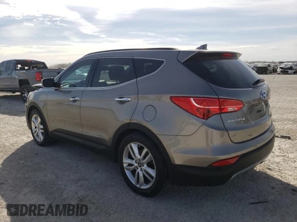 ✅ 2015 Hyundai Santa Fe • VIN: 5XYZW4LAXFG300942 • Лот: 41225833. Опубликован ранее на Copart с пробегом 54 683 миль. Бесплатный доступ к архиву аукционных продаж из США и подробный отчёт об истории автомобиля на DreamBid. Изображение 2.
