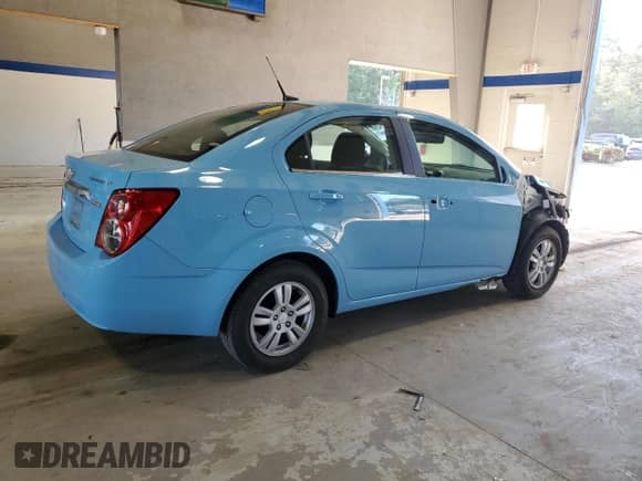 2014 Chevrolet Sonic LT с VIN 1G1JC5SB3E4158199, выставлен на аукционе Copart как лот 69577214 с пробегом 90 479 миль миль и Списание • Salvage title. История ставок и продаж доступна на DreamBid. Изображение 3.