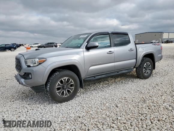 ✅ 2020 Toyota Tacoma TRD Sport • VIN: 3TMCZ5AN4LM317694 • Lot: 92999985. Listed on Copart with 77,904 mi. Free auction sales archive from the USA and detailed vehicle history report at DreamBid. Image 1.