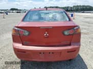 ✅ 2014 Mitsubishi Lancer SE • VIN: JA32V2FW3EU001210 • Lot: 63390235. Listed on Copart with 213,857 mi. Free auction sales archive from the USA and detailed vehicle history report at DreamBid. Image 6.