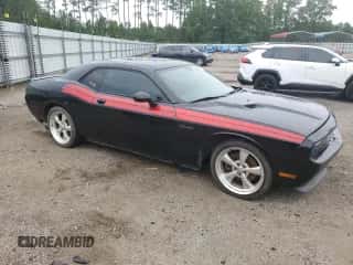 2013 Dodge Challenger R/T Classic z VIN 2C3CDYBT6DH511757, wystawiony jako Copart lot #66043334 z przebiegiem 175 539 mil mil oraz Szkoda całkowita • Salvage title. Historia ofert i sprzedaży dostępna na DreamBid. Obrazek 4.