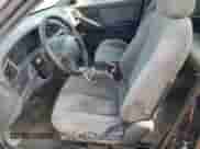 2003 Hyundai Elantra GLS z VIN KMHDN45DX3U590030, wystawiony jako Copart lot #69869194 z przebiegiem 161 175 mil mil oraz Czysty tytuł • Clean title. Historia ofert i sprzedaży dostępna na DreamBid. Obrazek 7.