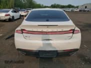 ✅ 2014 Lincoln MKZ Hybrid • VIN: 3LN6L2LU5ER823084 • Lot: 59597565. Listed on Copart with 126,402 mi. Free auction sales archive from the USA and detailed vehicle history report at DreamBid. Image 6.