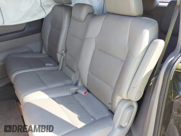 ✅ 2014 Honda Odyssey Touring • VIN: 5FNRL5H99EB051715 • Lot: 43405838. Listed on IAAI with 176,921 mi. Free auction sales archive from the USA and detailed vehicle history report at DreamBid. Image 8.