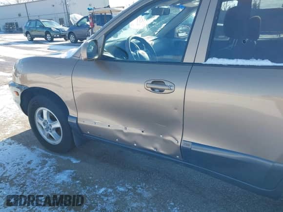 2002 Hyundai Santa Fe GLS z VIN KM8SC73D62U316002, wystawiony jako IAAI lot #41249855 z przebiegiem Nie podano mil oraz . Historia ofert i sprzedaży dostępna na DreamBid. Obrazek 6.