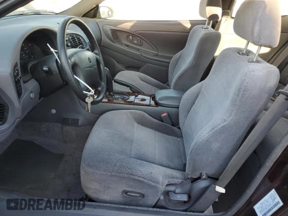 ✅ 1997 Chrysler Sebring • VIN: 4C3AU42N6VE180381 • Lot: 79449954. Listed on Copart with 126,425 mi. Free auction sales archive from the USA and detailed vehicle history report at DreamBid. Image 7.