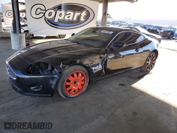 ✅ 2009 Jaguar XK • VIN: SAJWA43B695B28632 • Lot: 85404995. Wystawiony na Copart z przebiegiem 78 352 mil. Bezpłatny archiwum sprzedaży aukcyjnych z USA i szczegółowy raport historii pojazdu na DreamBid. Zdjęcie 1.