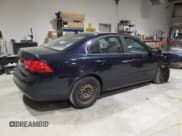 ✅ 2009 Kia Optima LX • VIN: KNAGE228695363723 • Лот: 93146205. Опубликован ранее на Copart с пробегом 186 543 миль. Бесплатный доступ к архиву аукционных продаж из США и подробный отчёт об истории автомобиля на DreamBid. Изображение 3.