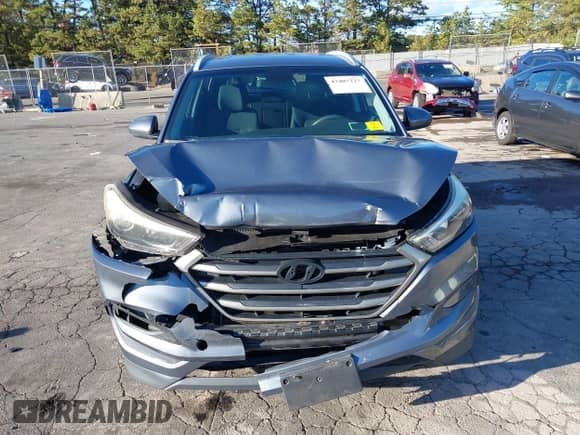 2016 Hyundai Tucson SE with VIN KM8J3CA48GU053428, listed as a IAAI auction lot 43407227 with 121,790 mi miles and . Bid and sale history available at DreamBid. Image 6.