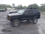 ✅ 2001 Jeep Cherokee Sport • VIN: 1J4FF58S81L514104 • Lot: 40029350. Listed on IAAI with 196,642 mi. Free auction sales archive from the USA and detailed vehicle history report at DreamBid. Image 2.