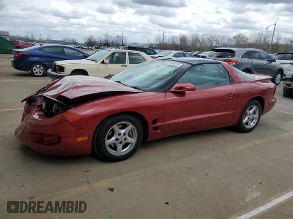 ✅ 1998 Pontiac Firebird Firebird • VIN: 2G2FS22K4W2210899 • Lot: 51608195. Listed on Copart with 99,553 mi. Free auction sales archive from the USA and detailed vehicle history report at DreamBid. Image 1.