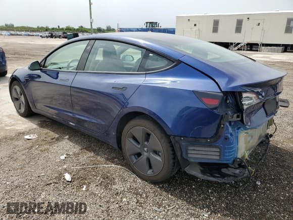 ✅ 2022 Tesla Model 3 • VIN: 5YJ3E1EA5NF285552 • Lot: 59768095. Listed on Copart with 113,387 mi. Free auction sales archive from the USA and detailed vehicle history report at DreamBid. Image 2.