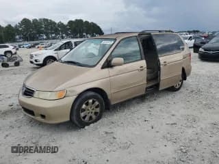 ✅ 2002 Honda Odyssey EX-L • VIN: 2HKRL189X2H586400 • Lot: 82102575. Wystawiony na Copart z przebiegiem 263 380 mil. Bezpłatny archiwum sprzedaży aukcyjnych z USA i szczegółowy raport historii pojazdu na DreamBid. Zdjęcie 1.