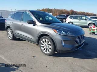 ✅ 2021 Ford Escape Titanium • VIN: 1FMCU9J95MUA05935 • Lot: 43631327. Listed on IAAI with 53,330 mi. Free auction sales archive from the USA and detailed vehicle history report at DreamBid. Image 1.