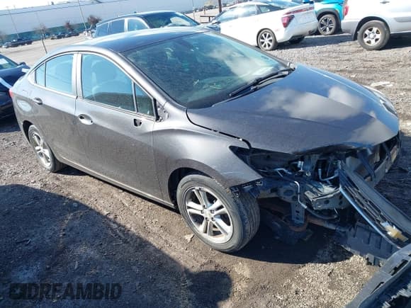 ✅ 2016 Chevrolet Cruze LT • VIN: 1G1BE5SMXG7273321 • Lot: 43491200. Listed on IAAI with 174,729 mi. Free auction sales archive from the USA and detailed vehicle history report at DreamBid. Image 1.