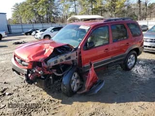 ✅ 2003 Mazda Tribute ES • VIN: 4F2CZ061X3KM04404 • Лот: 42708145. Опубликован ранее на Copart с пробегом 185 561 миль. Бесплатный доступ к архиву аукционных продаж из США и подробный отчёт об истории автомобиля на DreamBid. Изображение 1.
