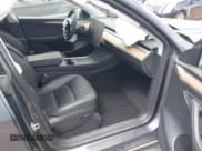 ✅ 2023 Tesla Model Y Long Range • VIN: 7SAYGDEE7PF852113 • Lot: 42315136. Listed on IAAI with 44,057 mi. Free auction sales archive from the USA and detailed vehicle history report at DreamBid. Image 5.