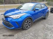 ✅ 2022 Toyota C-HR XLE • VIN: NMTKHMBX7NR141735 • Лот: 43545668. Опубликован ранее на IAAI с пробегом 50 873 миль. Бесплатный доступ к архиву аукционных продаж из США и подробный отчёт об истории автомобиля на DreamBid. Изображение 2.