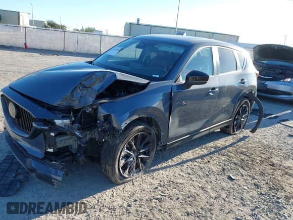 ✅ 2021 Mazda CX-5 Touring • VIN: JM3KFACM1M0371354 • Lot: 40938490. Listed on IAAI with 56,172 mi. Free auction sales archive from the USA and detailed vehicle history report at DreamBid. Image 19.