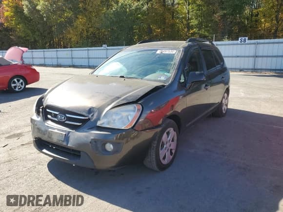 ✅ 2009 Kia Rondo LX • VIN: KNAFG528497260778 • Lot: 76497534. Listed on Copart with 276,585 mi. Free auction sales archive from the USA and detailed vehicle history report at DreamBid. Image 1.