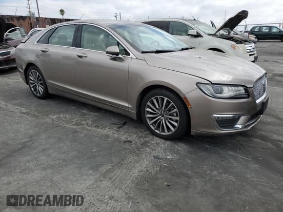 ✅ 2018 Lincoln MKZ Hybrid Premiere • VIN: 3LN6L5KU0JR628104 • Lot: 70831254. Listed on Copart with 82,334 mi. Free auction sales archive from the USA and detailed vehicle history report at DreamBid. Image 4.