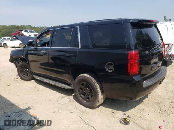 2019 Chevrolet Tahoe Commercial with VIN 1GNLCDECXKR241469, listed as a Copart auction lot 65674525 with Not provided miles and Salvage title. Bid and sale history available at DreamBid. Image 2.