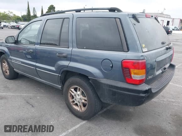 ✅ 2004 Jeep Grand Cherokee Laredo • VIN: 1J4GW48S74C223970 • Lot: 42408360. Listed on IAAI with 238,099 mi. Free auction sales archive from the USA and detailed vehicle history report at DreamBid. Image 3.